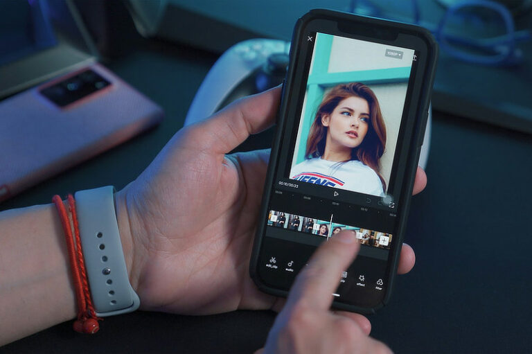 Young man editing video with CapCut.